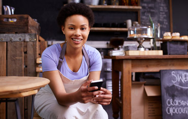 smiling woman on mobile phone